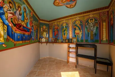 Chapel interior with ornate Byzantine murals and icons